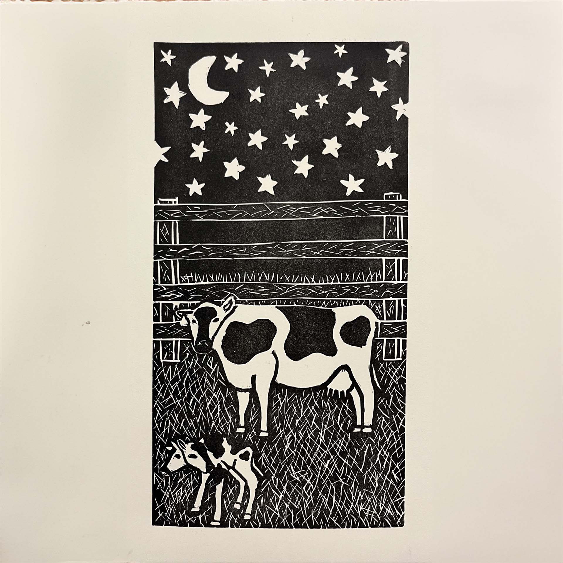 drawing of one larger cow and a smaller cow with two heads at night time in front of a fence in their field.