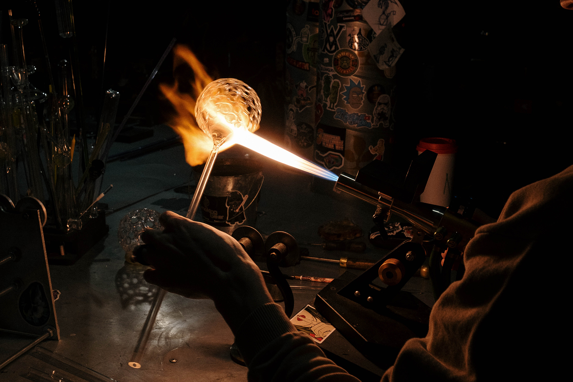 Glass blower in action at the hot shop