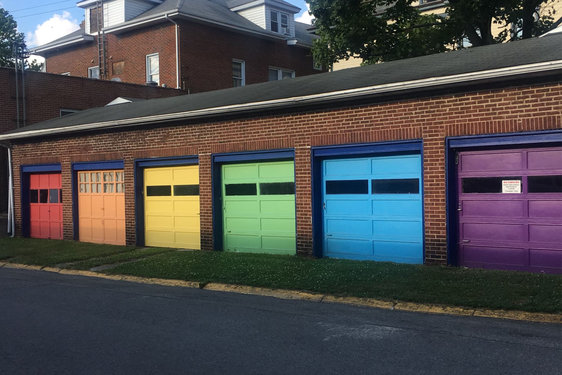 A row of rainbow garages in Morgantown's South Park neighborhood
